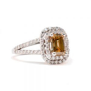 square cut citrine ring surrounded by diamonds