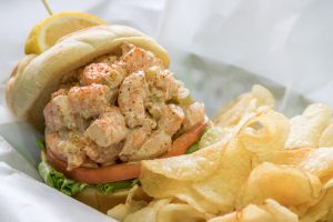 shrimp salad sandwich and golden chips